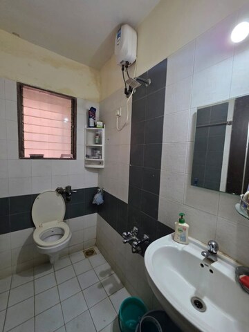 Bathroom in 3 BHK Apartment at Gemstar Nestle Apartments, Malad West – for Rent