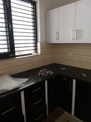 Kitchen in 1.5 BHK Builder Floor at Sector 18 – for Rent
