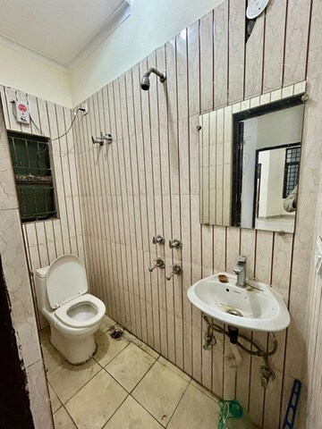 Bathroom in 2 BHK Builder Floor at Chattarpur – for Rent