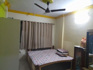 Bedroom in 2 BHK Apartment at Swastik Mira Apartment, New Panvel – for Rent
