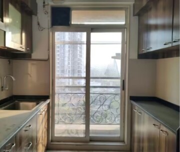 Kitchen in 2 BHK Apartment at Brahmand CHS, Brahmand – for Sale