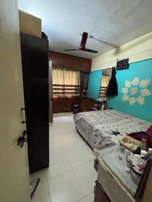 Bedroom in 2 BHK Apartment at Nandan Vatsalya Nagri, Kothrud – for Rent