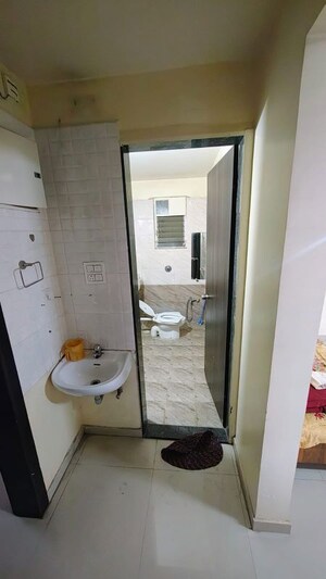 Bathroom in 2 BHK Apartment at Sai Venkata Astoria Royals, Ravet – for Rent
