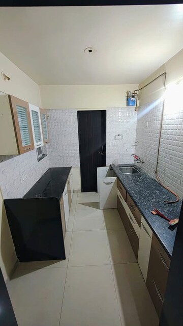 Kitchen in 2 BHK Apartment at Sai Venkata Astoria Royals, Ravet – for Rent