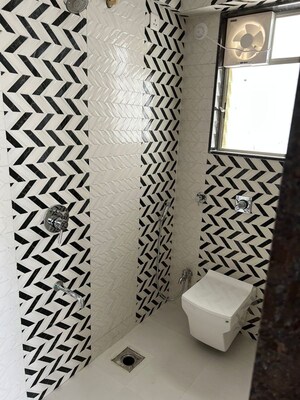 Bathroom in 4 BHK Apartment at Sahajanand Society – for Sale