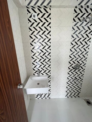 Bathroom in 4 BHK Apartment at Sahajanand Society – for Sale