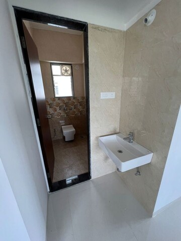 Bathroom in 4 BHK Apartment at Sahajanand Society – for Sale