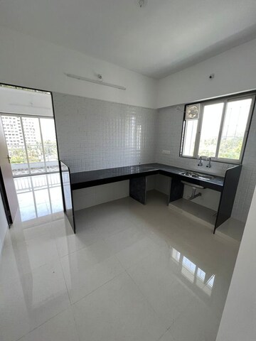 Kitchen in 4 BHK Apartment at Sahajanand Society – for Sale