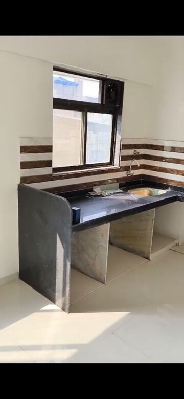Kitchen in 2 BHK Apartment at Tanishque Harsh Kusum Residence, Dadar West – for Rent