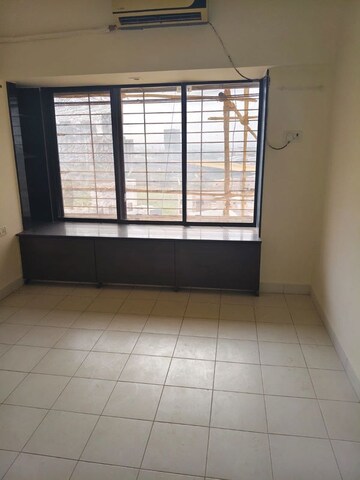 Room in 2 BHK Apartment at Atul Blue Horizon II, Malad West – for Rent