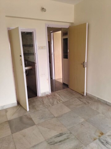 Room in 2 BHK Apartment at Atul Blue Horizon II, Malad West – for Rent