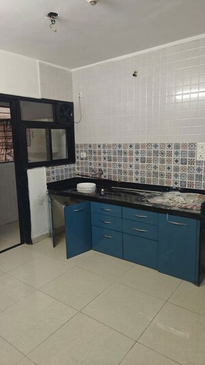Kitchen in 2 BHK Apartment at Nanded City Pancham, Nanded – for Sale