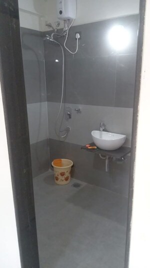 Bathroom in 3 BHK Apartment at Mhada 24 LIG Apartments, Goregaon West – for Rent