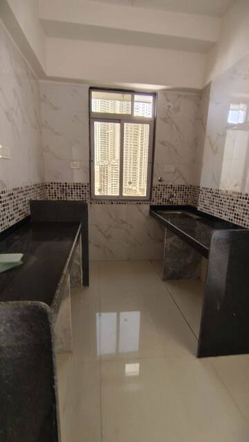 Kitchen in 1 BHK Apartment at DGS Sheetal Hira, Malad East – for Rent
