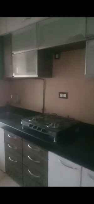 Kitchen in 2.5 BHK Apartment at Rustomjee OZone, Goregaon West – for Rent