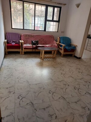 Living Room in 2 BHK Apartment at Vishal Nagar CHS Malad, Malad West – for Rent