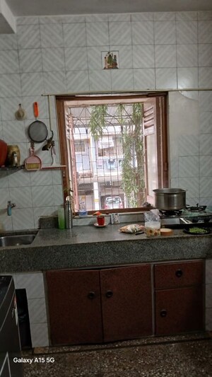 Living Room in 2 BHK Apartment at Vishal Nagar CHS Malad, Malad West – for Rent