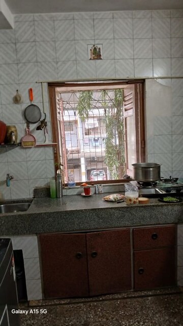 Living Room in 2 BHK Apartment at Vishal Nagar CHS Malad, Malad West – for Rent