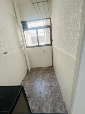 Bathroom in 2 BHK Apartment at Snehmangal Infinity Cube, Punawale – for Rent