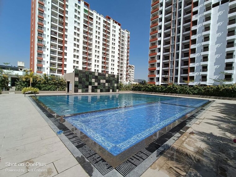 Swimming Pool, majestique-rhythm-county-phase-1 2 Bedroom 977 Sq.Ft. Apartment In Handewadi Pune 9986959