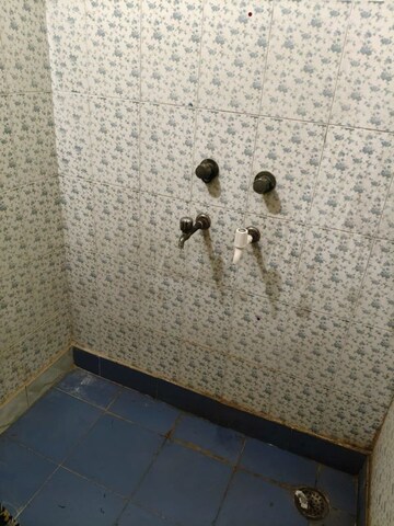 Bathroom in 3 BHK Apartment at AWHO Brahmaputra Apartments, Sector 29 – for Rent