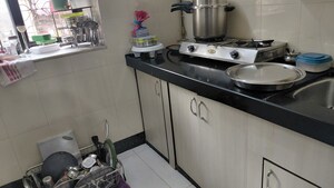 Kitchen in 1 BHK Apartment at Yashodham Complex, Goregaon East – for Sale