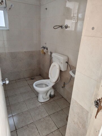 Bathroom in 2 BHK Apartment at Shree Vardhman Green Court, Sector 90 – for Rent