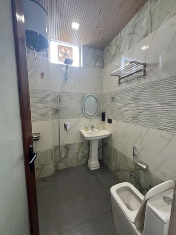 Bathroom in 3 BHK Builder Floor at Aamwala – for Rent