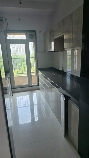 Kitchen in 2 BHK Apartment at Rustomjee Urbania Azziano, Thane West – for Rent