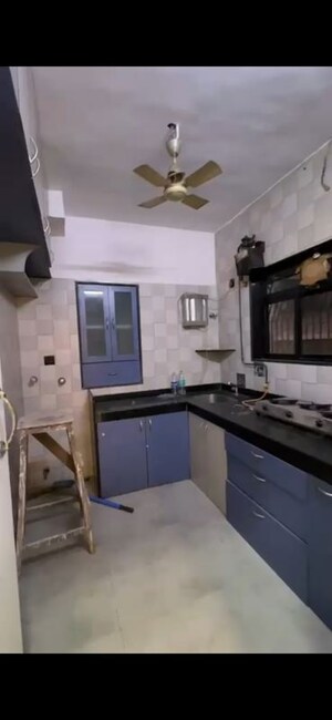 Kitchen in 2 BHK Apartment at Blue Pearl Apartment, Malad West – for Rent