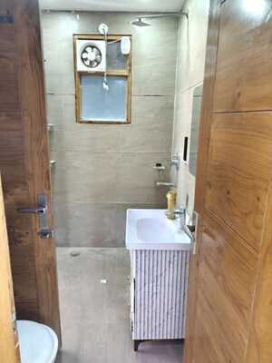 Bathroom in 4 BHK Builder Floor at Green Fields Colony – for Rent