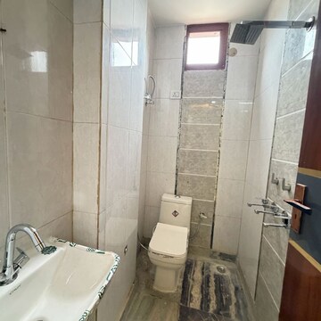 Bathroom in 3 BHK Builder Floor at Dwarka Mor – for Rent