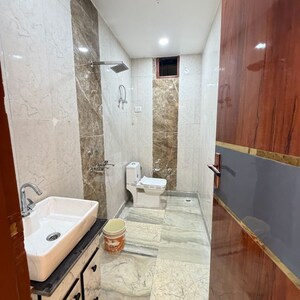 Bathroom in 3 BHK Builder Floor at Dwarka Mor – for Rent