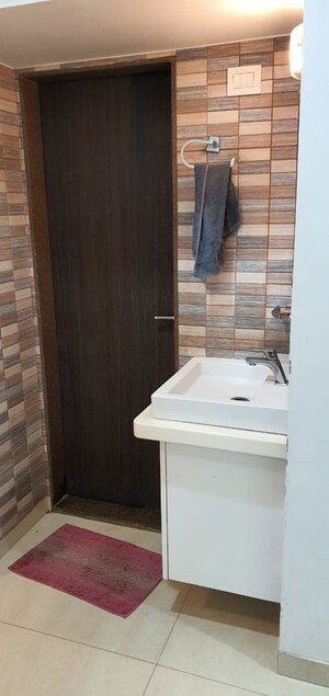 Bathroom in 2 BHK Apartment at Prakruti Pearl, Ghodbunder Road – for Rent