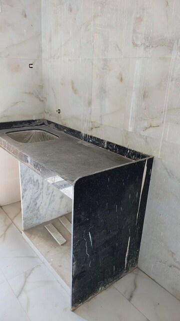 Kitchen in 1 BHK Apartment at Metropolis Bayside, Kasarvadavali – for Rent