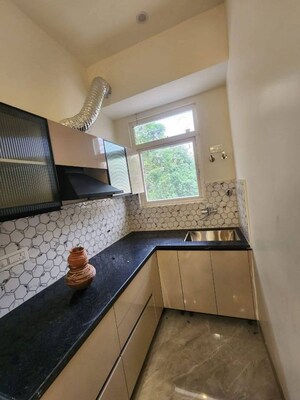 Kitchen in 1 BHK Builder Floor at The Grand, Sector 52 – for Rent