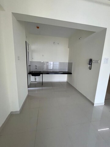 Kitchen in 2 BHK Apartment at Kolte Patil R10, Hinjewadi – for Rent