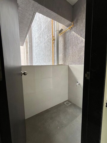 Bathroom in 2 BHK Apartment at Kolte Patil R10, Hinjewadi – for Rent