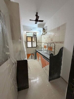 Kitchen in 2 BHK Apartment at Dn Nagar – for Rent