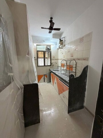Kitchen in 2 BHK Apartment at Dn Nagar – for Rent