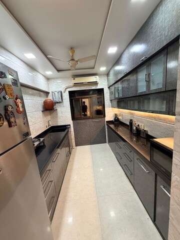Kitchen in 2 BHK Apartment at Shri Sai Ganesh CHS, Goregaon West – for Rent