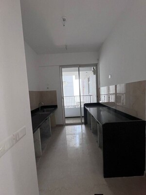 Kitchen in 2 BHK Apartment at Courtyard by Narang Realty and The Wadhwa Group, Pokhran Road No Two – for Rent