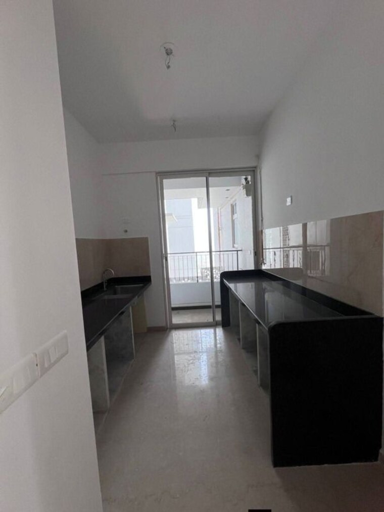 Kitchen, courtyard-by-narang-realty-and-the-wadhwa-group 2 Bedroom 950 Sq.Ft. Apartment In Pokhran Road No Two Thane 9987570