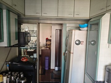 Kitchen in 2 BHK Apartment at Yashodhara CHS, Goregaon East – for Rent