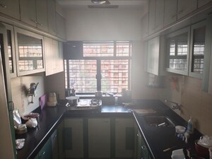 Kitchen in 2 BHK Apartment at Yashodhara CHS, Goregaon East – for Rent
