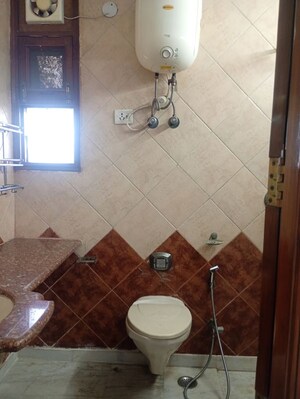 Bathroom in 4 BHK Apartment at Sector 12 Dwarka – for Rent