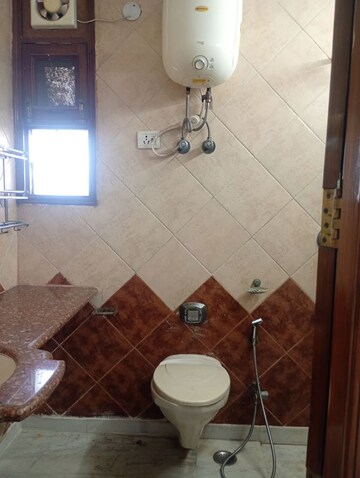 Bathroom in 4 BHK Apartment at Sector 12 Dwarka – for Rent
