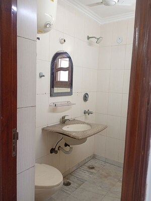 Bathroom in 4 BHK Apartment at Sector 12 Dwarka – for Rent