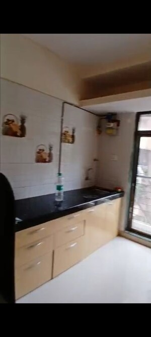 Kitchen in 1 BHK Apartment at Asmi Vintage, Goregaon West – for Sale