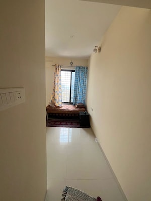 Building Lobby in 1 BHK Apartment at Wadgaon Sheri – for Rent